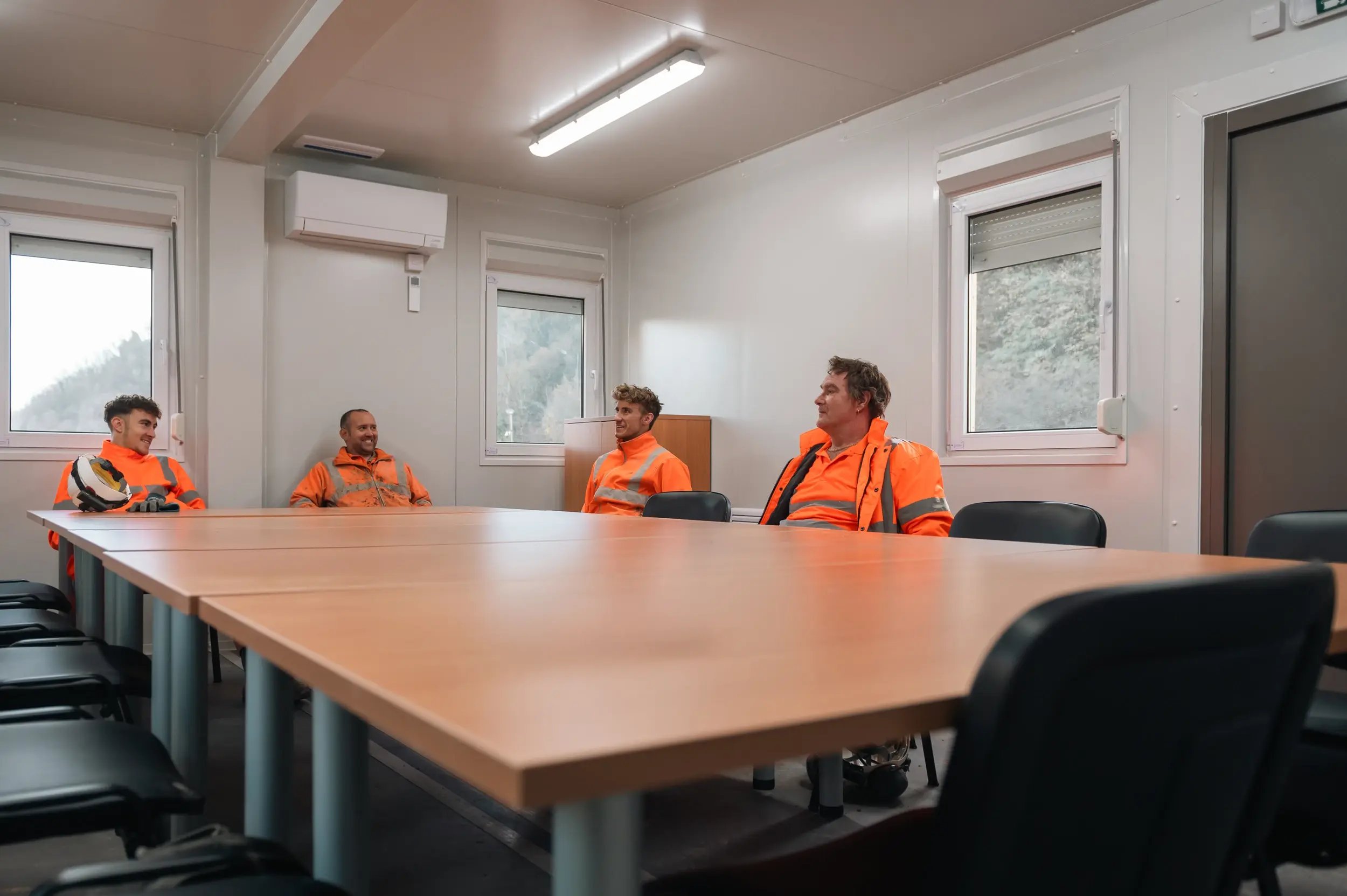 tf-jackson-construction-group-of-workers-take-break-in-modular-welfare-unit