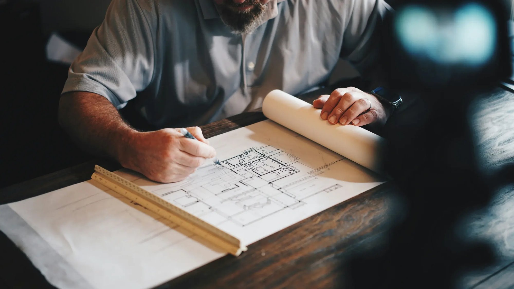tf-jackson-portable-and-modular-buildings-project-delivery-worker-checking-plans
