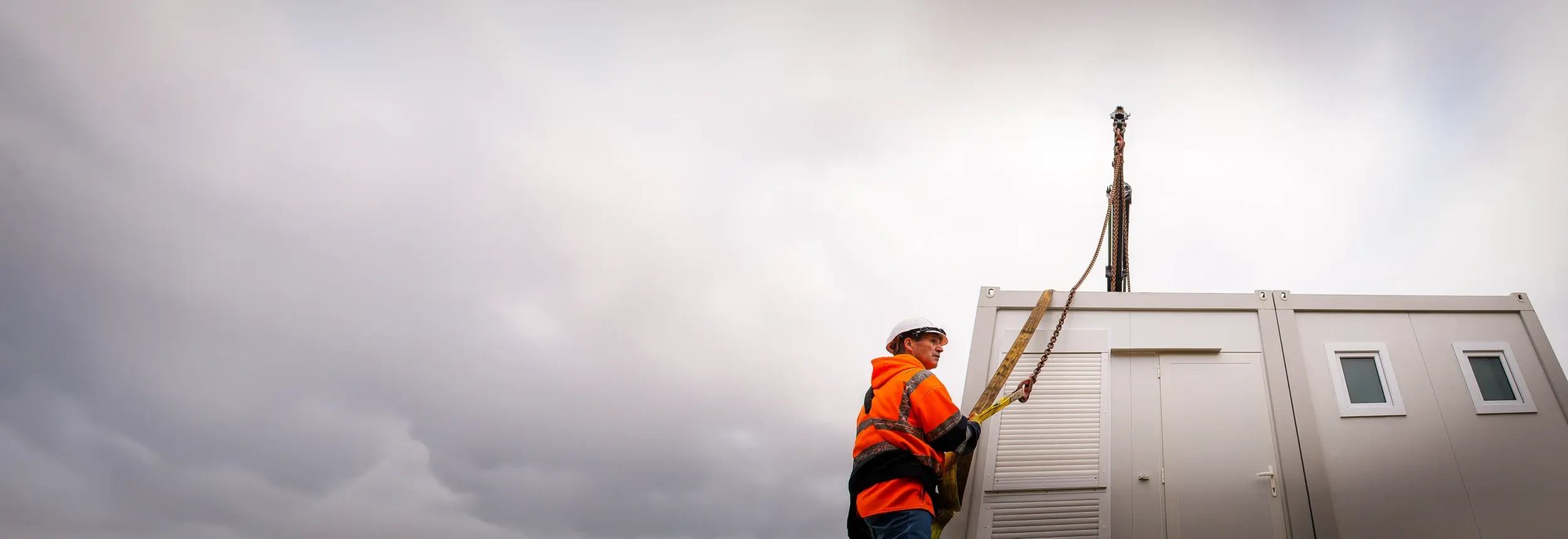 tf-jackson-wide-homepage-worker-maximise-space-worker-installs-portable-building