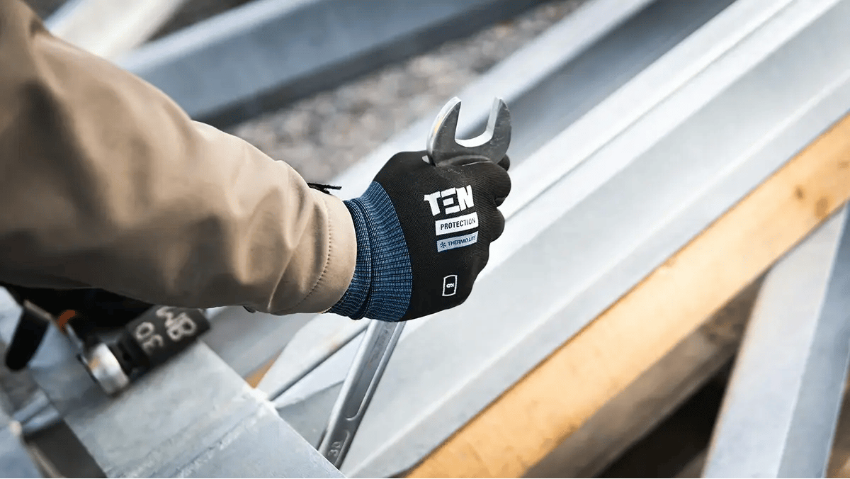 tf-jackson-used-buildings-worker-repairs-modular-building-with-spanner